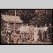 Boys next to flagpole (ddr-densho-330-7)