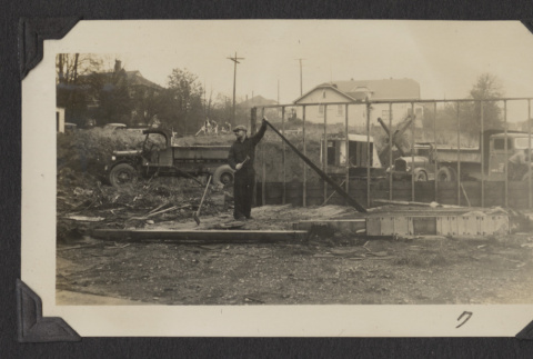Man works at the temple construction site (ddr-sbbt-4-64)