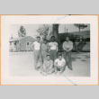Six men outside barracks (ddr-densho-493-57)