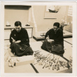 Two men demonstrating carving (ddr-densho-426-2072)