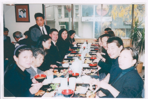 Family funeral luncheon (ddr-densho-477-794)
