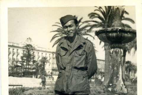Soldier in front of a fountain (ddr-densho-22-296)