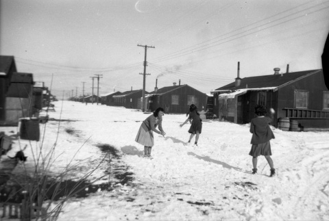 Jeanette Nishimura, Matsuye Takeuchi, and Amy throwing snowballs (ddr-densho-570-64)