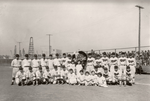 Document with photo of Alameda ATK and Meiji University baseball teams and transcription of article about game (ddr-ajah-5-40)