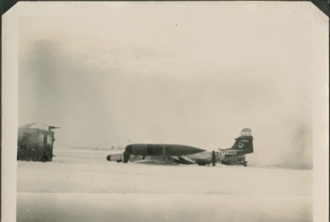 Air Force plane in a snow field (ddr-densho-321-301)