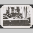 Men relaxing on board ship (ddr-densho-466-162)