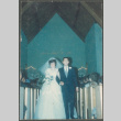 Bride and groom walking down the aisle (ddr-densho-523-342)