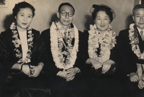 Kocho Otani, his wife, and others wearing leis (ddr-njpa-4-1903)