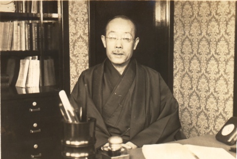 A man at his desk (ddr-njpa-4-2211)