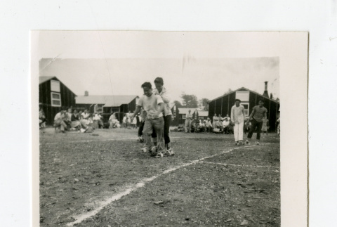 Three-legged race in Jerome camp (ddr-csujad-38-97)