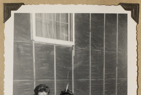 The Kikawas pose with a teddy bear (ddr-densho-542-462)