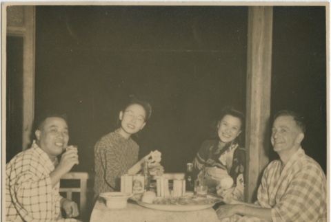 A group eating dinner (ddr-densho-296-141)