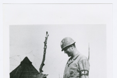 Serviceman and child on Okinawa (ddr-densho-1007-84)
