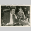 Man and women seated in restaurant (ddr-densho-426-817)
