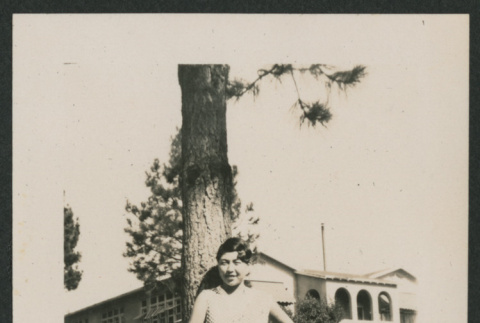woman next to tree (ddr-densho-378-863)