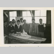 Battleship model and working crew (ddr-densho-37-1351)