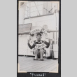 Joe Ishikawa posed with lifebuoy (ddr-densho-468-360)