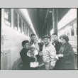 Sakura family at train station (ddr-densho-523-414)