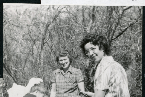 Photograph of L. Josephine Hawes and Thelma McBride at a Manzanar hospital staff picnic (ddr-csujad-47-278)