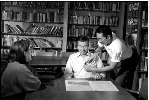 Frank S. Emi with Loni Ding and crew member (ddr-densho-1007-1161)