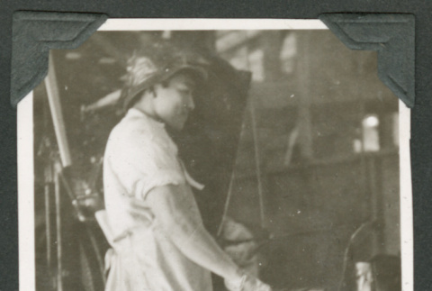 Man working at cannery (ddr-densho-540-72)