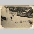 Two skiers on slope by houses (ddr-densho-466-812)