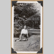 Toy seated on a lawn (ddr-densho-542-302)