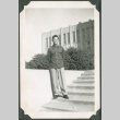 A man standing in front of a building (ddr-densho-328-223)
