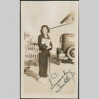 Woman on sidewalk by driveway (ddr-densho-316-213)