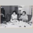 Couple at dinner party (ddr-densho-522-130)