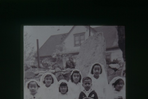 (Slide) - Image of six girls in first communion dress and boy (ddr-densho-330-19-master-99951654a0)