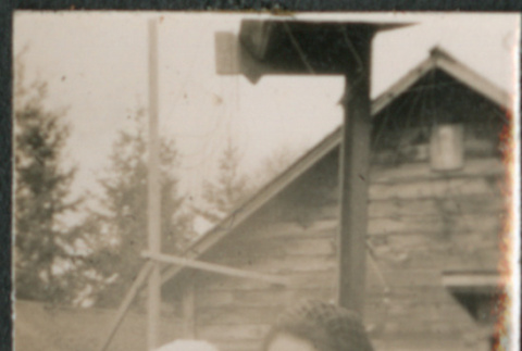 Woman holding baby (ddr-densho-523-110)