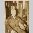 A man sitting in a chair (ddr-njpa-1-1264)