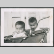 Photo of two children in a pram (ddr-densho-483-788)