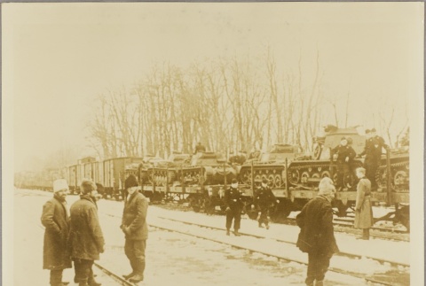 Soldiers near a train (ddr-njpa-13-1609)