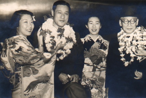 Frank Takizo Matsumoto and another Diet member receiving leis (ddr-njpa-4-839)