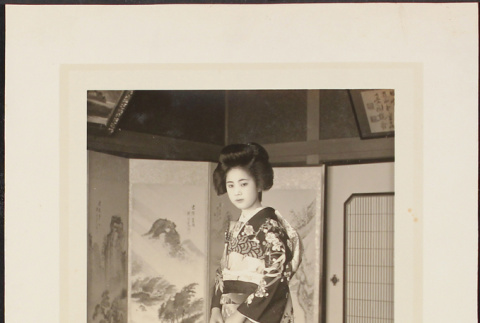 A woman posing in a formal kimono (ddr-densho-278-75)
