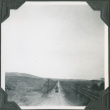 Road with line of trucks (ddr-ajah-2-209)