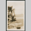 man in front of a palm (ddr-densho-378-383)