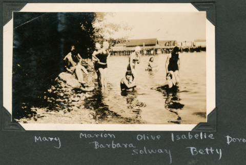 Photo of women swimming near a dock (ddr-densho-483-231)
