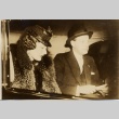 Hans Thomsen riding in a car with a woman (ddr-njpa-1-2018)