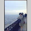 Martha (Nozawa) Tsuchida at railing of Eiffel Tower (ddr-densho-426-708)