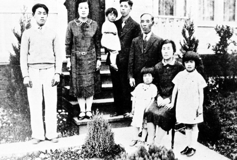 Family in front of house (ddr-densho-28-2)
