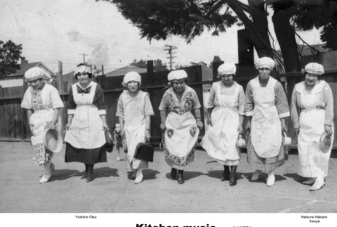 Group of women in aprons and bonnets bowing (ddr-ajah-3-348)
