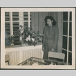 Woman standing by arrangement (ddr-densho-316-420)