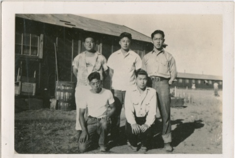 A group standing in front of barracks (ddr-densho-296-101)