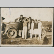 Group of five woman and a man standing by car (ddr-densho-316-191)