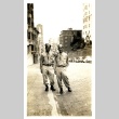 Two soldiers in a city street (ddr-densho-22-284)