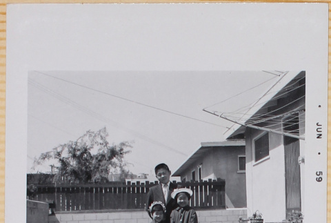 William, Susan and Leslie Shiomi standing in yard (ddr-densho-522-489)