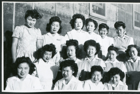 Photograph of the hospital staff aides in front of the Manzanar hospital (ddr-csujad-47-194)